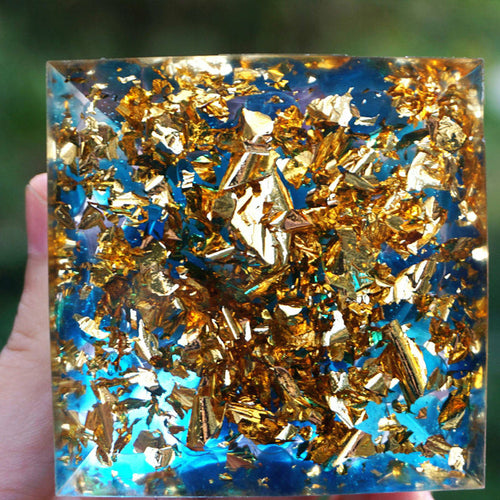 Peridot and tiger’s eye orgonite pyramid