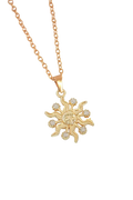 Gold sun-shaped pendant necklace on a white background with gold stars.