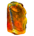 Rough Ethiopian Welo opal specimen held between fingers