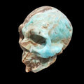 Hand-carved hemimorphite skull specimen