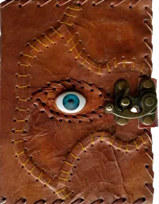 A brown leather journal with a unique stitched eye design and a brass spiral clasp closure, shown against a plain white background.