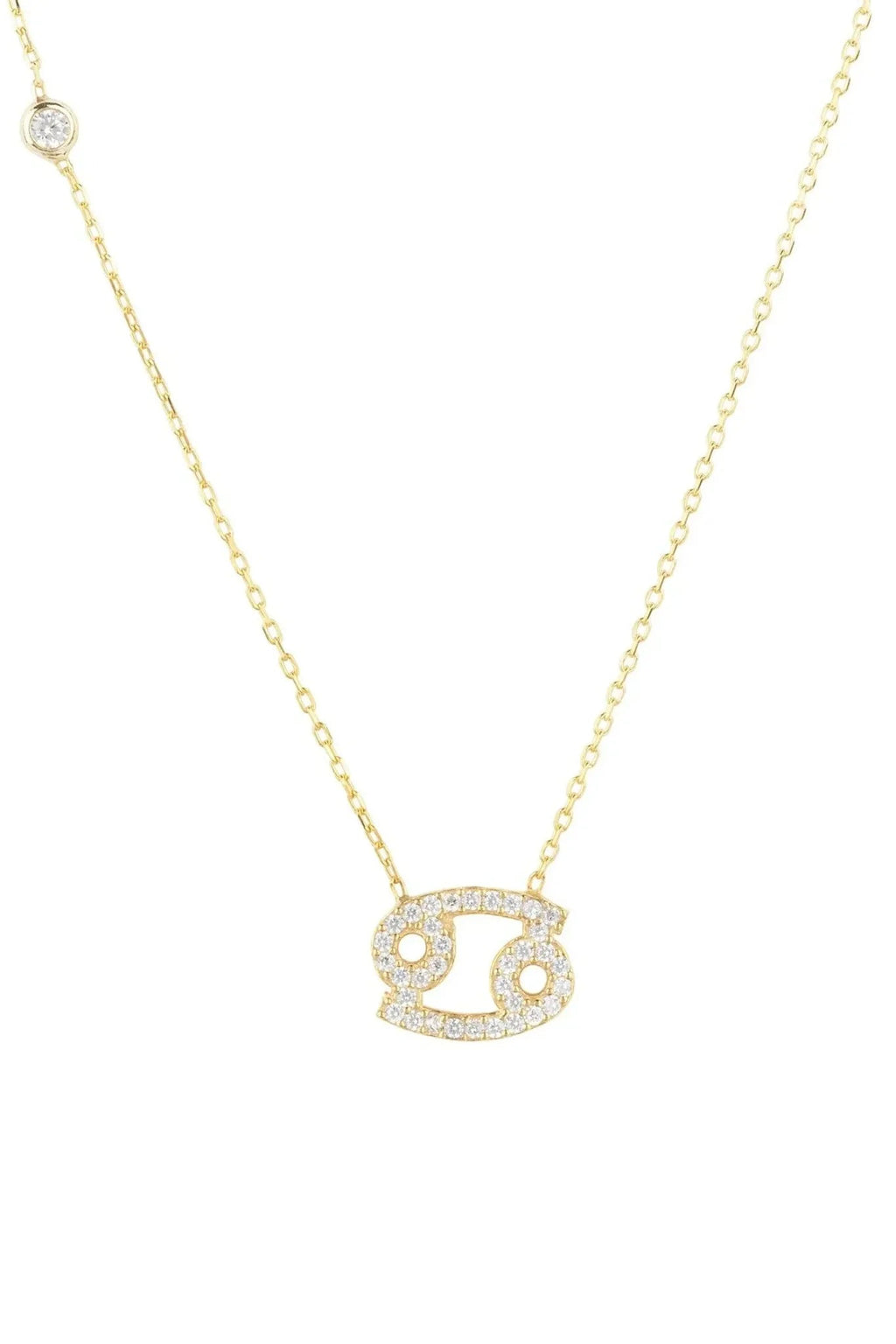 Cancer zodiac pendant necklace in gold-plated sterling silver on a white background.