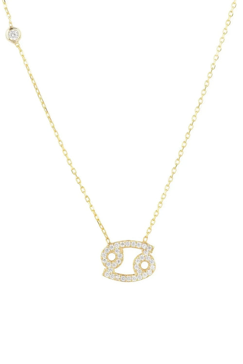 Cancer zodiac pendant necklace in gold-plated sterling silver on a white background.